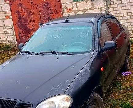 Черный Дэу Ланос, объемом двигателя 1.6 л и пробегом 200 тыс. км за 1700 $, фото 2 на Automoto.ua