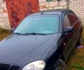 Черный Дэу Ланос, объемом двигателя 1.6 л и пробегом 200 тыс. км за 1700 $, фото 2 на Automoto.ua