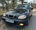 Черный Дэу Ланос, объемом двигателя 1.5 л и пробегом 112 тыс. км за 1800 $, фото 1 на Automoto.ua