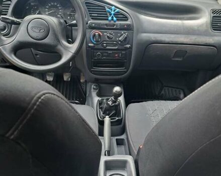 Черный Дэу Ланос, объемом двигателя 1.5 л и пробегом 158 тыс. км за 1250 $, фото 12 на Automoto.ua