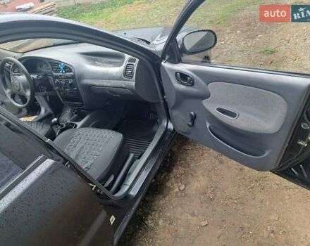 Черный Дэу Ланос, объемом двигателя 1.5 л и пробегом 158 тыс. км за 1250 $, фото 15 на Automoto.ua