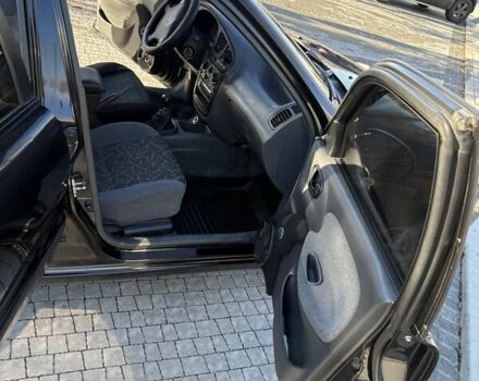 Дэу Ланос 2007 в Киеве на Automoto.ua Черный Дэу Ланос, объемом двигателя 1.6 л и пробегом 190 тыс. км за 2800 $, фото 6 на Automoto.ua