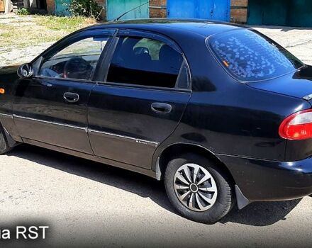 Черный Дэу Ланос, объемом двигателя 1.5 л и пробегом 200 тыс. км за 2350 $, фото 3 на Automoto.ua