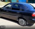 Черный Дэу Ланос, объемом двигателя 1.5 л и пробегом 200 тыс. км за 2350 $, фото 3 на Automoto.ua