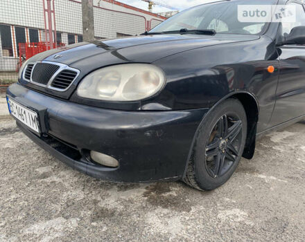 Черный Дэу Ланос, объемом двигателя 1.5 л и пробегом 280 тыс. км за 1300 $, фото 1 на Automoto.ua