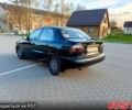 Черный Дэу Ланос, объемом двигателя 1.4 л и пробегом 123 тыс. км за 1600 $, фото 1 на Automoto.ua