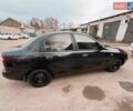 Чорний Деу Ланос, об'ємом двигуна 1.39 л та пробігом 200 тис. км за 1850 $, фото 2 на Automoto.ua