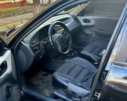 Чорний Деу Ланос, об'ємом двигуна 1.5 л та пробігом 363 тис. км за 1420 $, фото 4 на Automoto.ua