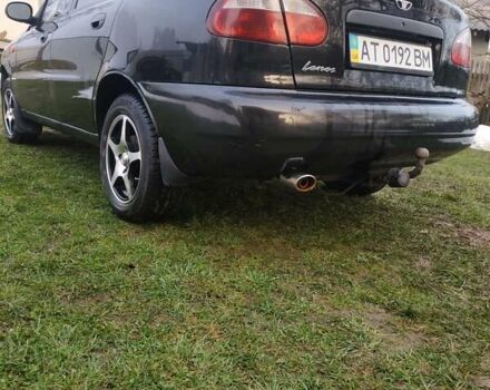 Черный Дэу Ланос, объемом двигателя 1.4 л и пробегом 140 тыс. км за 2200 $, фото 16 на Automoto.ua