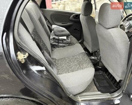 Черный Дэу Ланос, объемом двигателя 0 л и пробегом 150 тыс. км за 1250 $, фото 4 на Automoto.ua