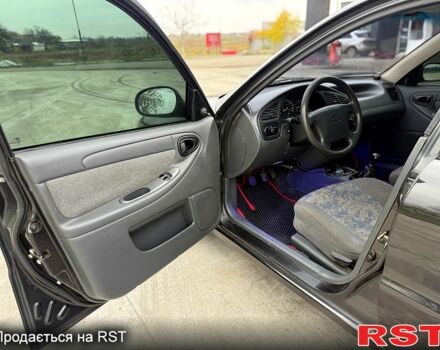 Чорний Деу Ланос, об'ємом двигуна 1.5 л та пробігом 240 тис. км за 2750 $, фото 6 на Automoto.ua