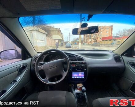 Черный Дэу Ланос, объемом двигателя 1.5 л и пробегом 220 тыс. км за 1350 $, фото 6 на Automoto.ua