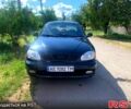 Черный Дэу Ланос, объемом двигателя 1.5 л и пробегом 255 тыс. км за 3200 $, фото 1 на Automoto.ua