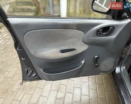 Черный Дэу Ланос, объемом двигателя 0 л и пробегом 150 тыс. км за 1250 $, фото 12 на Automoto.ua