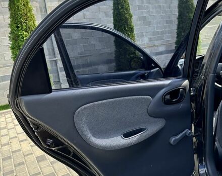 Черный Дэу Ланос, объемом двигателя 1.5 л и пробегом 176 тыс. км за 2899 $, фото 6 на Automoto.ua