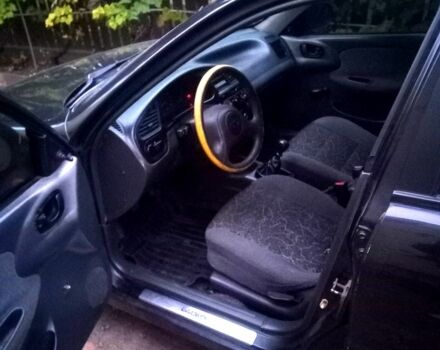 Черный Дэу Ланос, объемом двигателя 1.5 л и пробегом 110 тыс. км за 1780 $, фото 1 на Automoto.ua