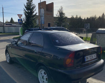Черный Дэу Ланос, объемом двигателя 1.5 л и пробегом 287 тыс. км за 1990 $, фото 1 на Automoto.ua