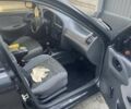 Черный Дэу Ланос, объемом двигателя 1.4 л и пробегом 124 тыс. км за 2200 $, фото 2 на Automoto.ua