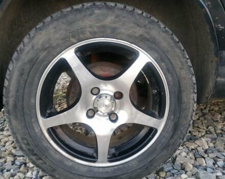 Черный Дэу Ланос, объемом двигателя 1.4 л и пробегом 140 тыс. км за 2200 $, фото 11 на Automoto.ua