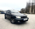 Черный Дэу Ланос, объемом двигателя 1.5 л и пробегом 146 тыс. км за 1650 $, фото 1 на Automoto.ua