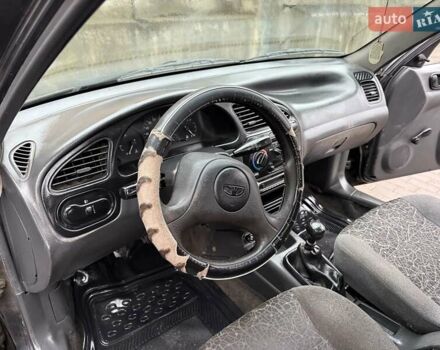 Черный Дэу Ланос, объемом двигателя 0 л и пробегом 150 тыс. км за 1250 $, фото 7 на Automoto.ua