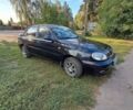 Черный Дэу Ланос, объемом двигателя 1.5 л и пробегом 250 тыс. км за 1700 $, фото 1 на Automoto.ua