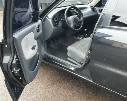 Черный Дэу Ланос, объемом двигателя 1.5 л и пробегом 198 тыс. км за 3200 $, фото 1 на Automoto.ua