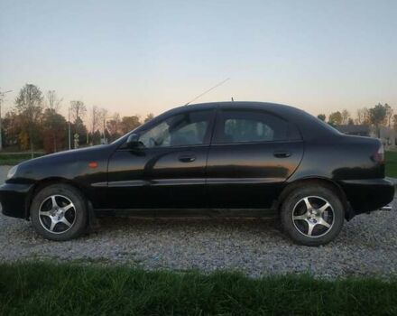 Черный Дэу Ланос, объемом двигателя 1.4 л и пробегом 140 тыс. км за 2200 $, фото 3 на Automoto.ua