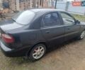 Черный Дэу Ланос, объемом двигателя 1.5 л и пробегом 158 тыс. км за 1250 $, фото 1 на Automoto.ua