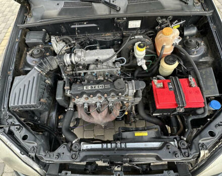 Чорний Деу Ланос, об'ємом двигуна 1.5 л та пробігом 181 тис. км за 1888 $, фото 9 на Automoto.ua