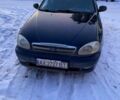 Черный Дэу Ланос, объемом двигателя 3.5 л и пробегом 222 тыс. км за 2400 $, фото 1 на Automoto.ua