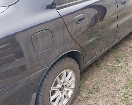 Чорний Деу Ланос, об'ємом двигуна 1.5 л та пробігом 165 тис. км за 2600 $, фото 2 на Automoto.ua