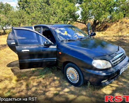 Черный Дэу Ланос, объемом двигателя 1.5 л и пробегом 253 тыс. км за 2300 $, фото 2 на Automoto.ua