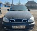 Черный Дэу Ланос, объемом двигателя 1.6 л и пробегом 270 тыс. км за 1400 $, фото 1 на Automoto.ua