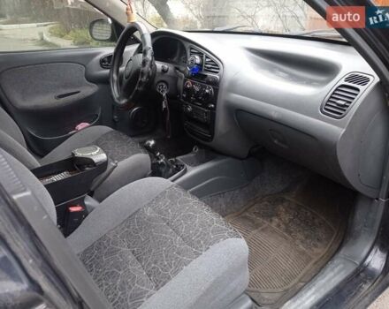 Черный Дэу Ланос, объемом двигателя 1.5 л и пробегом 141 тыс. км за 1700 $, фото 5 на Automoto.ua