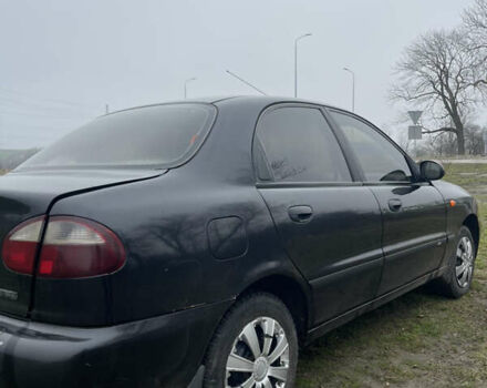 Черный Дэу Ланос, объемом двигателя 1.5 л и пробегом 150 тыс. км за 2000 $, фото 6 на Automoto.ua