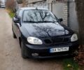 Чорний Деу Ланос, об'ємом двигуна 1.6 л та пробігом 140 тис. км за 2900 $, фото 1 на Automoto.ua