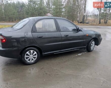Черный Дэу Ланос, объемом двигателя 1.5 л и пробегом 210 тыс. км за 1600 $, фото 1 на Automoto.ua