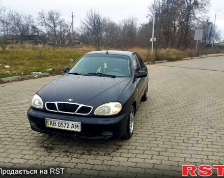 Черный Дэу Ланос, объемом двигателя 1.6 л и пробегом 200 тыс. км за 1600 $, фото 1 на Automoto.ua