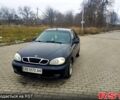 Черный Дэу Ланос, объемом двигателя 1.6 л и пробегом 200 тыс. км за 1600 $, фото 1 на Automoto.ua