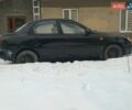 Черный Дэу Ланос, объемом двигателя 1.5 л и пробегом 180 тыс. км за 2000 $, фото 1 на Automoto.ua