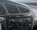 Черный Дэу Ланос, объемом двигателя 1.5 л и пробегом 186 тыс. км за 2999 $, фото 11 на Automoto.ua