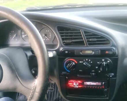 Черный Дэу Ланос, объемом двигателя 1.4 л и пробегом 140 тыс. км за 2200 $, фото 12 на Automoto.ua