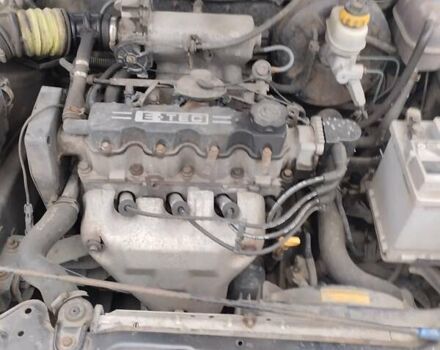 Черный Дэу Ланос, объемом двигателя 1.5 л и пробегом 145 тыс. км за 1200 $, фото 2 на Automoto.ua