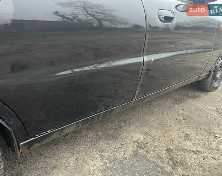 Черный Дэу Ланос, объемом двигателя 1.5 л и пробегом 201 тыс. км за 1000 $, фото 7 на Automoto.ua