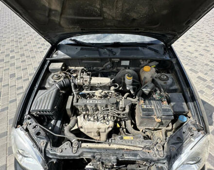 Деу Ланос 2007 у Кропивницькому (Кіровограді) на Automoto.ua Чорний Деу Ланос, об'ємом двигуна 1.5 л та пробігом 180 тис. км за 2899 $, фото 13 на Automoto.ua