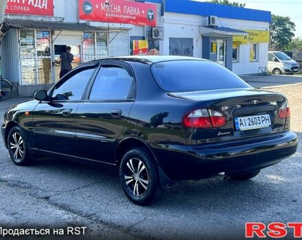 Чорний Деу Ланос, об'ємом двигуна 1.5 л та пробігом 251 тис. км за 2550 $, фото 1 на Automoto.ua