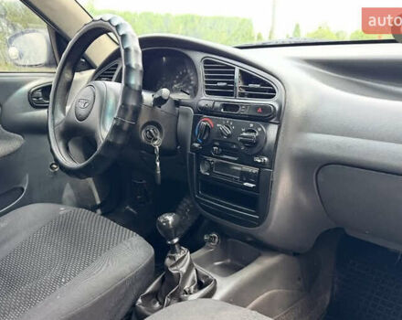 Черный Дэу Ланос, объемом двигателя 1.5 л и пробегом 233 тыс. км за 2200 $, фото 5 на Automoto.ua