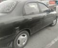 Черный Дэу Ланос, объемом двигателя 1.5 л и пробегом 142 тыс. км за 1500 $, фото 4 на Automoto.ua