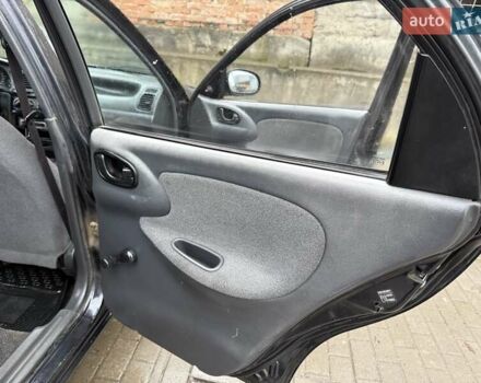 Черный Дэу Ланос, объемом двигателя 0 л и пробегом 150 тыс. км за 1250 $, фото 3 на Automoto.ua